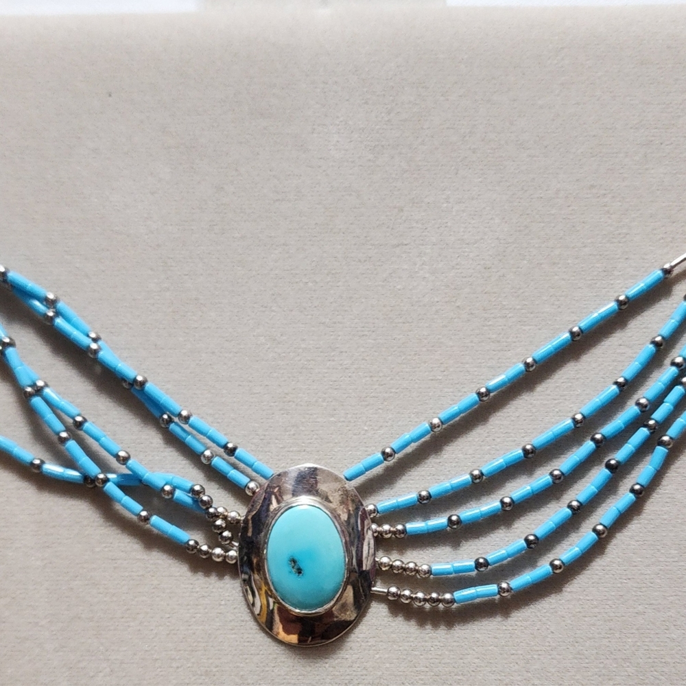 Turquoise Handmade Necklace with small tubular beads and sterling silver.
